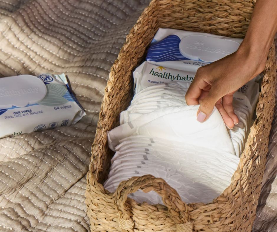 A basket stocked with non-toxic HealthyBaby diapers and wipes