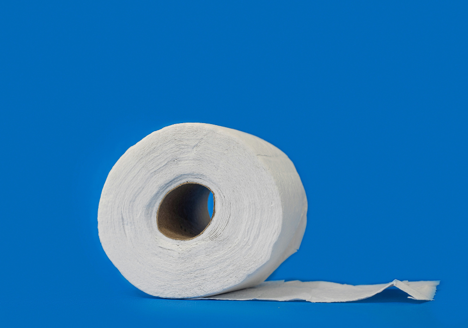 A roll of toilet paper on a blue background